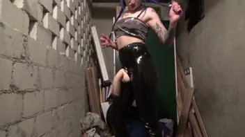 Latex Dominatrix Teases with Strap-On Dirty Talk